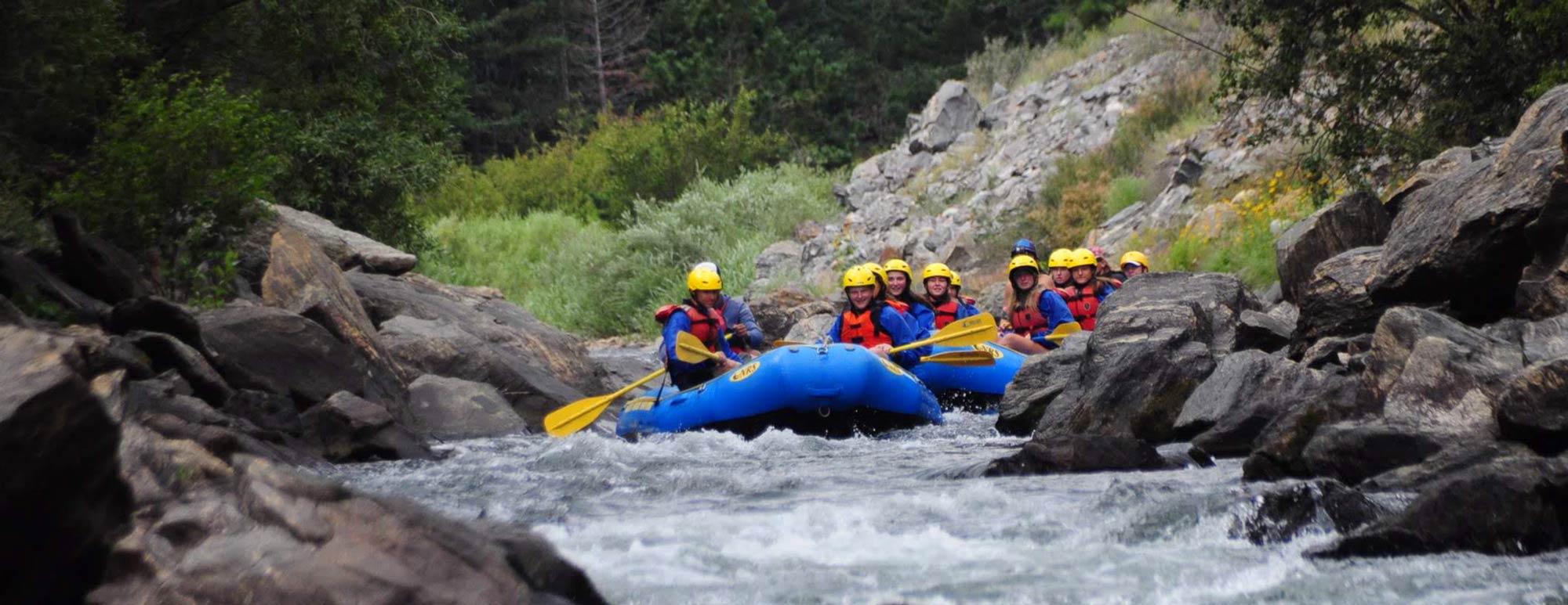 Campers head into the rapids on the Arkansas River