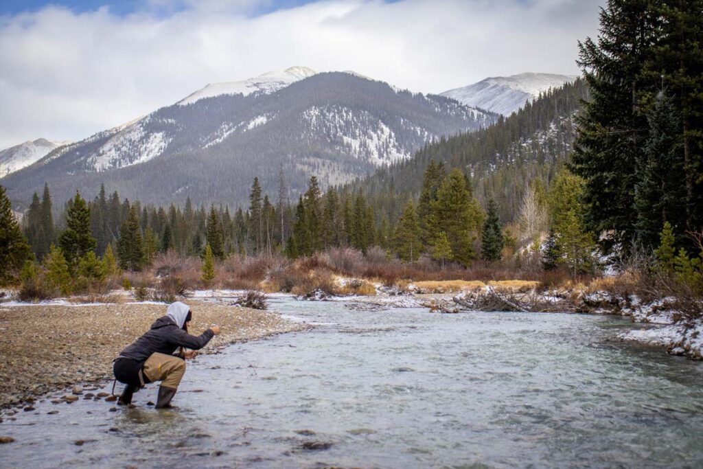 A participant in the river during a Beyond the Classroom professional development class