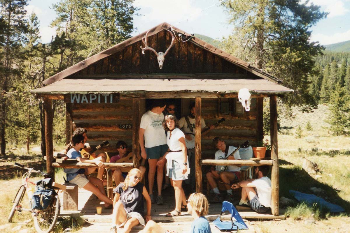 Summer Counselors on the Wapiti cabin porch in the 1980s