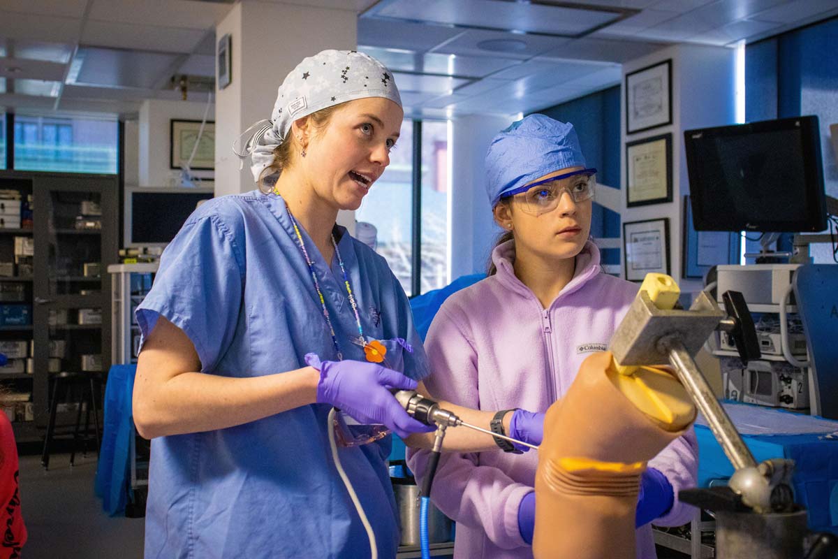 Our SPRI lab mentor teaching a Girls in STEM student in the laboratory